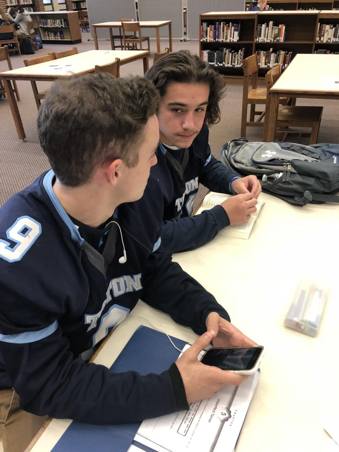 Triton Regional High School students Jack Crocker (left) and Jon Rolfe (right) discussing Brett Kavanaugh.