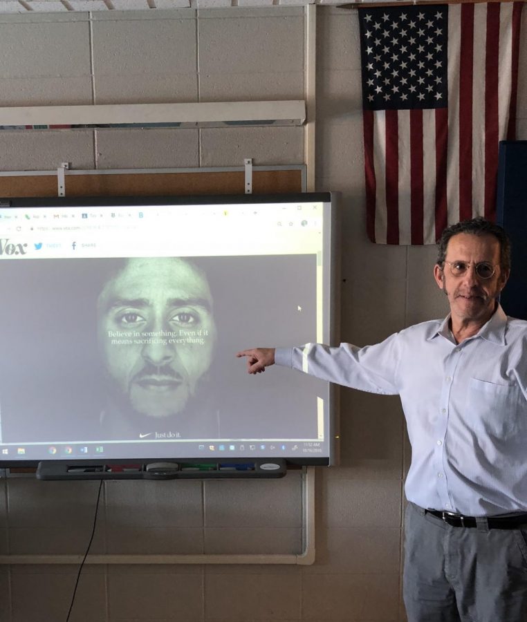 Fisher teaching his class about the Kaepernick Ad, and the ramifications that followed
