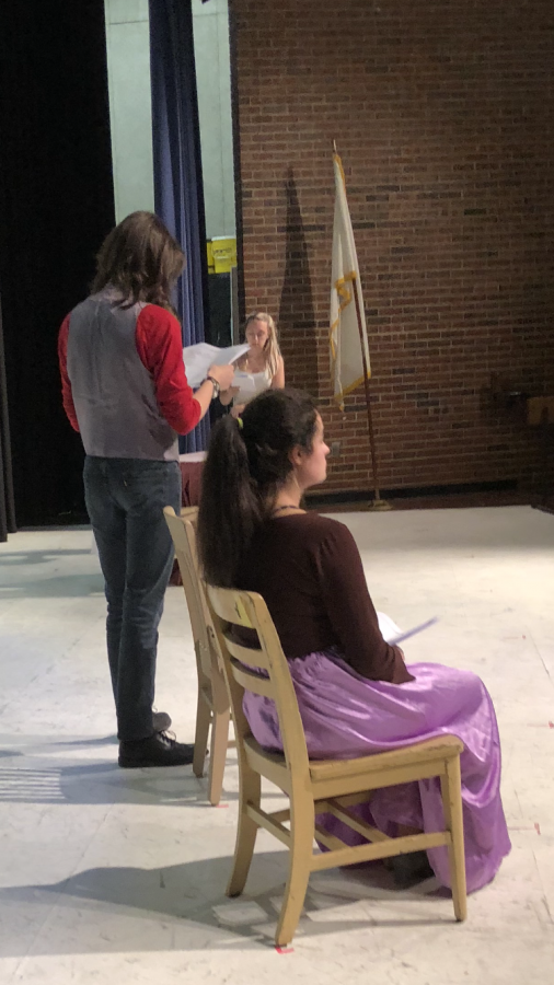Students Madison Butler, Olivia Valley, and Jonathan Woodbury practice for an upcoming theatrical production.