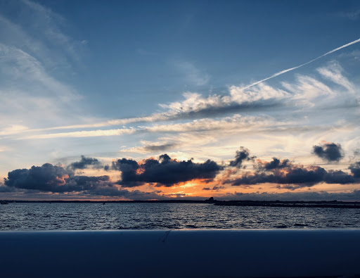 A sunset off of Newburyport. With the recent climate report detailing the disparity of the Earth’s ozone layer, how many more sunsets like these can we expect? (Andrew Photos)
