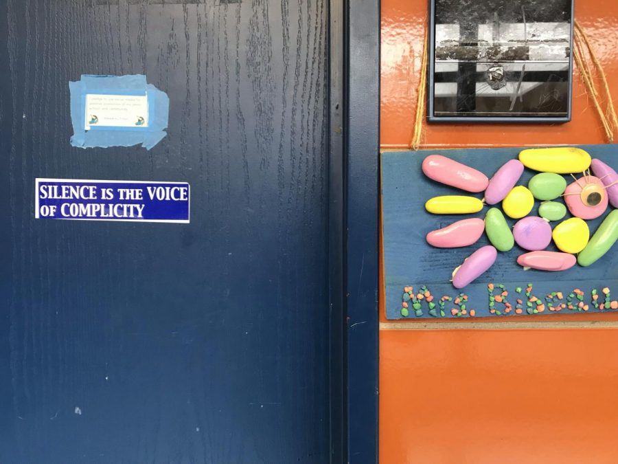 Inspirational sticker on Bibeau’s classroom door reads,“Silence is the voice of complicity”.