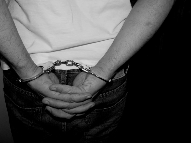 Teenager in handcuffs 