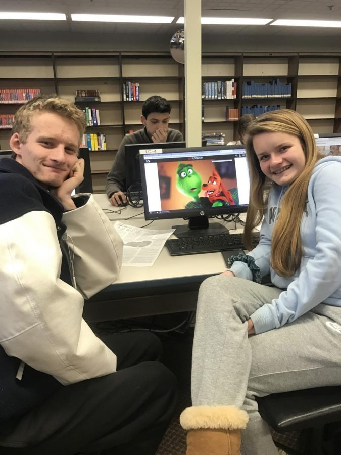Left, Connor Beevers, Right, Erin Gershuny, looking at the new animated Grinch Christmas Movie