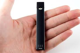 A Juul e-cigarette resembles a long USB flash drive. It can be recharged with pods.