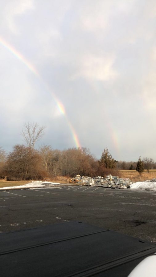 The double rainbow in the back parking lot of Triton on Parade day for the Patriots