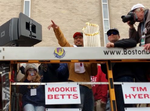 A scene from Bostons New England Patriots Parade that rolled through town early last month and led to nearly 1/3 of students taking the day off