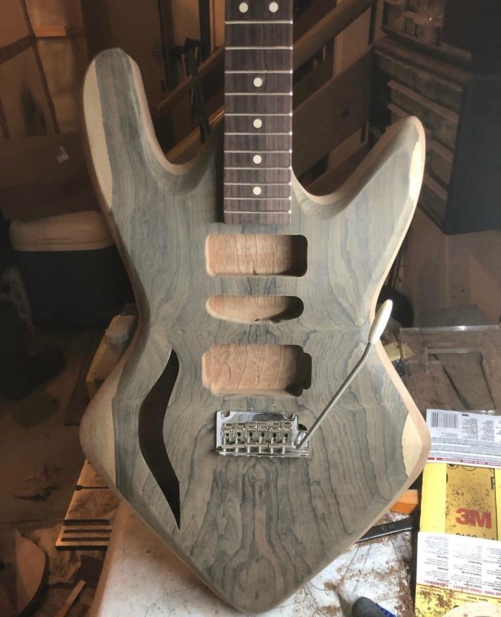 Senior Ethan Tougas makes his own guitars, including this one, in his garage.