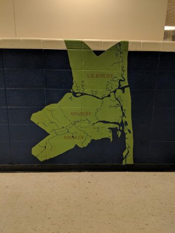A painting just outside of the main office that shows the three towns, reminding the students that walk by it everyday of the unity and origin of the school. 
