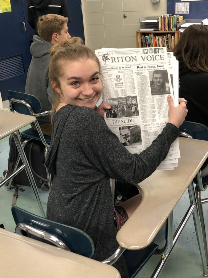 Bridget+Tucker+preparing+to+deliver+the+weekly+newspaper+to+the+neighboring+Triton+classrooms