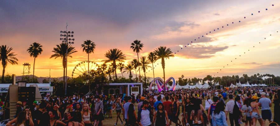 Photo of the festival with a sunset in the background.