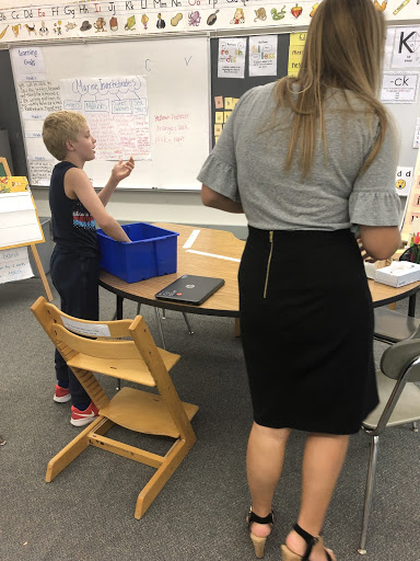 Ms. Donovan helping out a fifth grade student (Christina Varsamis)
