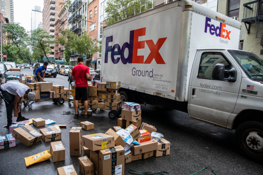 Streets of Manhattan, crowded with delivery trucks and packages (NY times photo) 