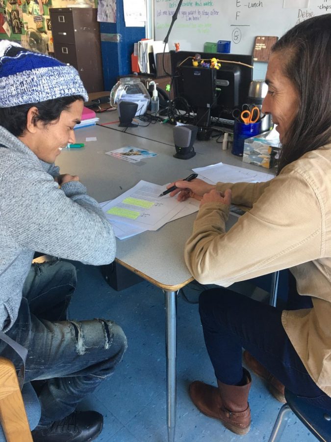 Carla Wagner, academic support teacher, hard at work teaching Robi Ullah on a Thursday afternoon.