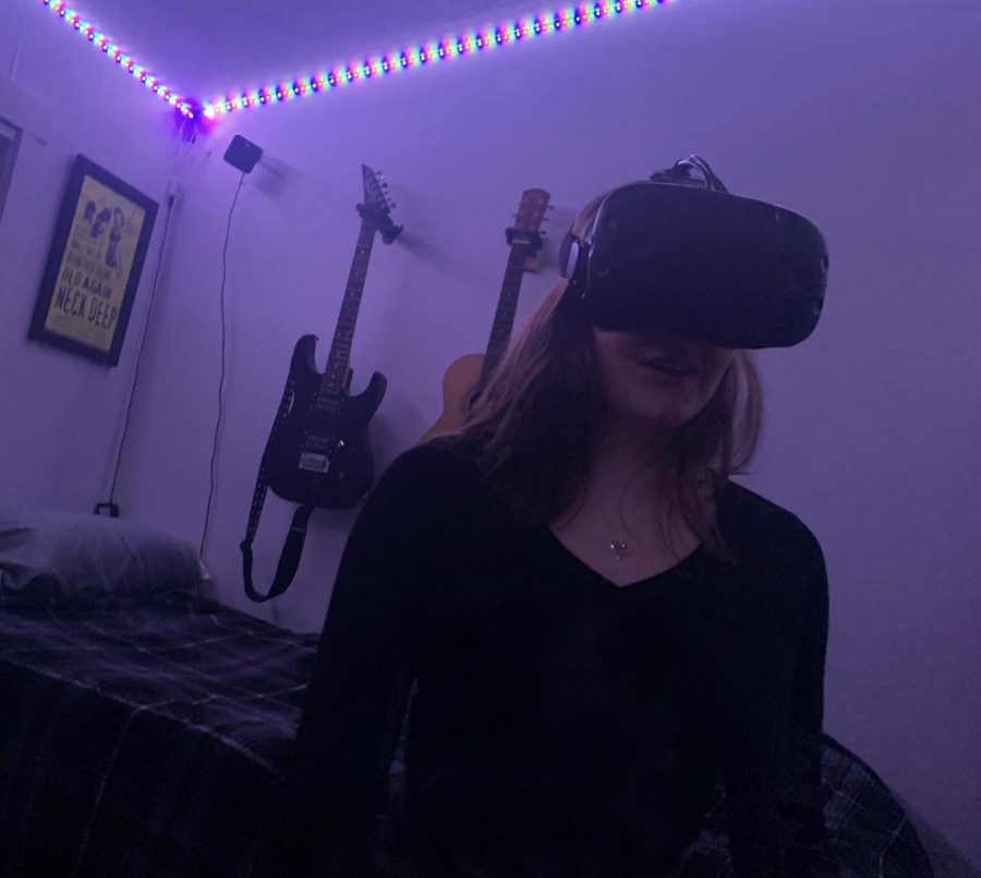 Triton junior Savannah Sweeney tries an HTC Vive for the first time.