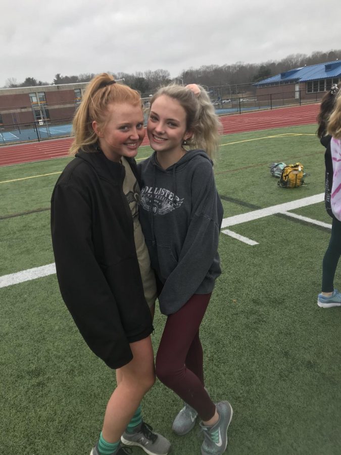 Junior Morgan Mead and Sophomore Riley Watkins getting ready for the spring track season at a pre season work out held after school