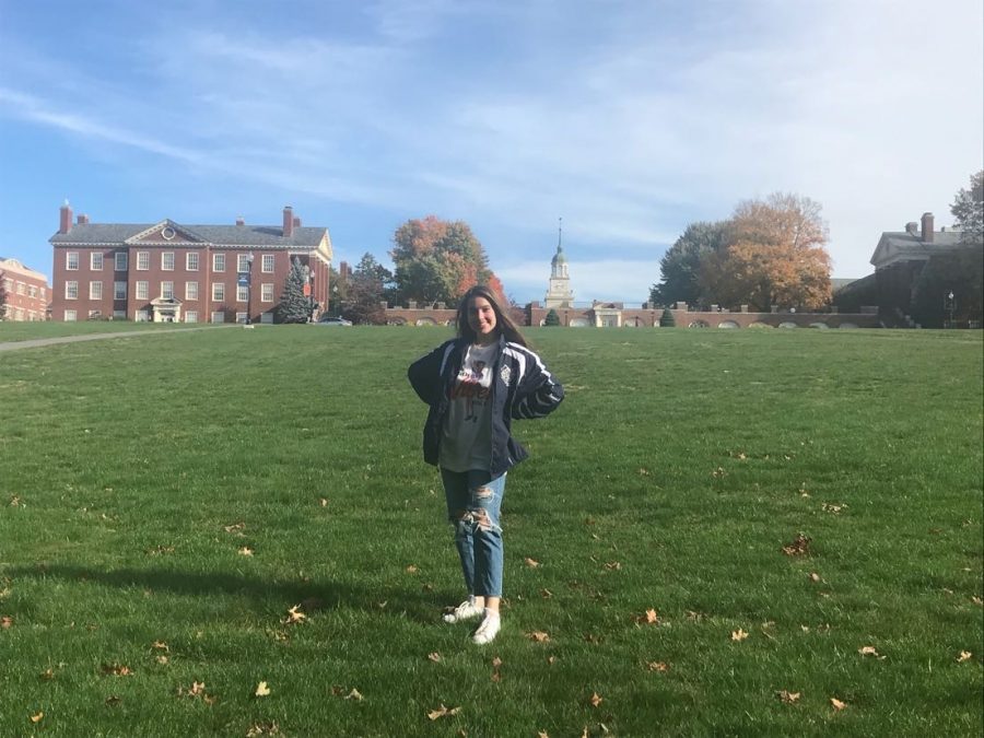 Photographed is Sammie Marinello in front of the Bucknell University campus