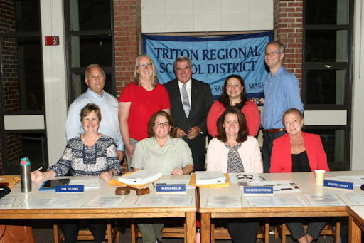 the Triton Regional School district committee poses during a recent school meeting