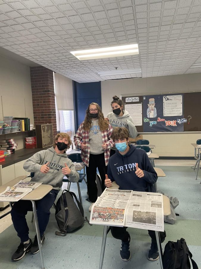 Seniors Jared Leonard, Sydney Marsh, Ellie Gay-Killeen, and Kyle Bouley showing their spirit on Triton Logo Day.