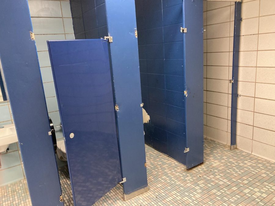 An upstairs high school bathroom stall door mysteriously disappeared, most likely due to the Devious Lick trend