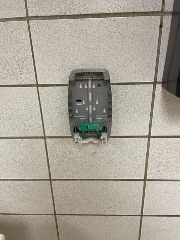 A soap dispenser is missing in the girls bathroom after it was vandalized last month.