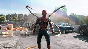 Parker dons the Iron Spider armor to duel with Doc Ock 