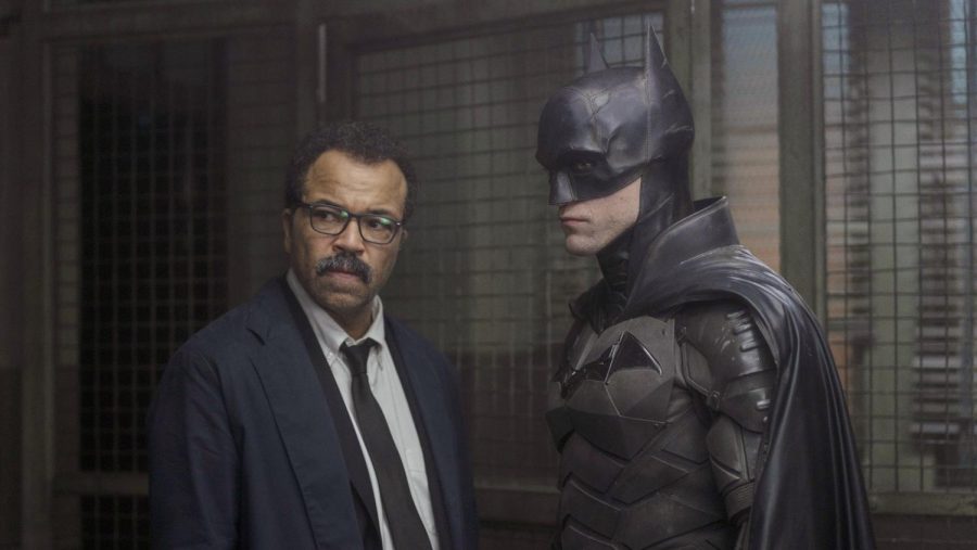 Batman (Robert Pattinson, right) and Jim Gordon (Jeffrey Wright, left) at the Gotham City Police Department