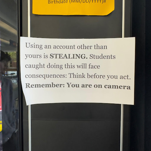 vending machines note telling students to not use other peoples codes and cameras are watching them