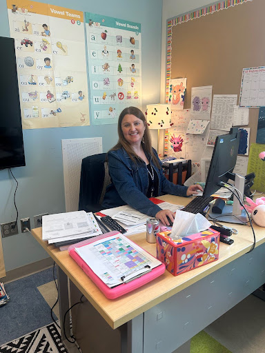 Ms. Shayne Ostrowski hard at work at her desk.