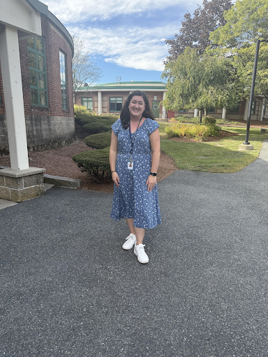 Gianna Faragi, new NES kindergartner, poses in front of the school. 