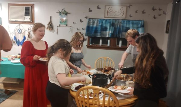 Senior CJ Weisenstein celebrating THanksgiving with family member