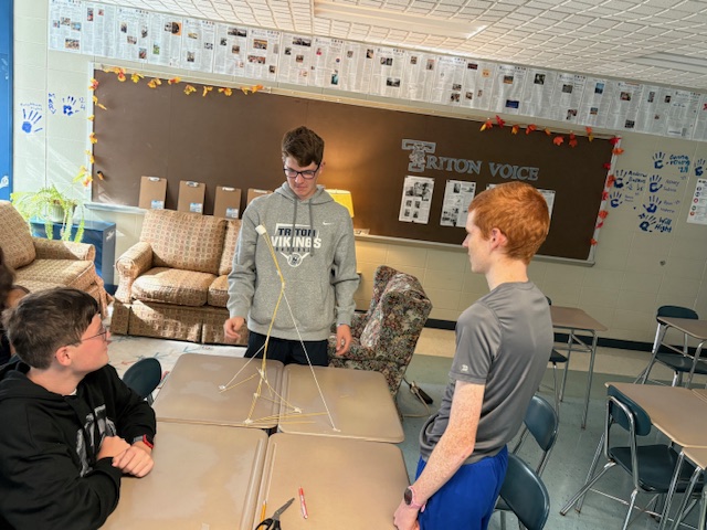 Students in Mr. Allen's AP Language class begin the period with a structure and team-building challenge.