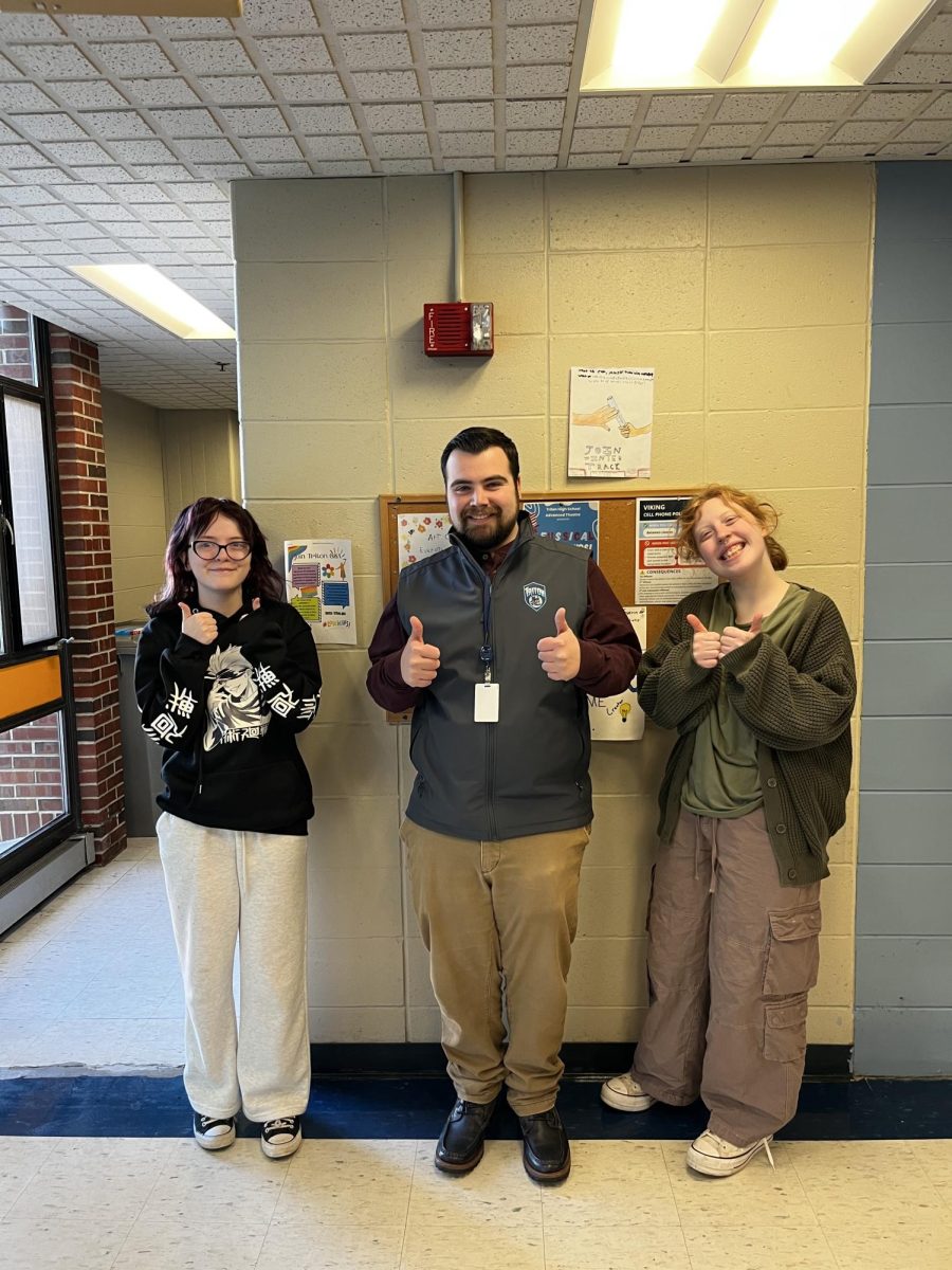 Image of advisor Sean Godbout and seniors Willow Murnahan and CJ Weisenstein